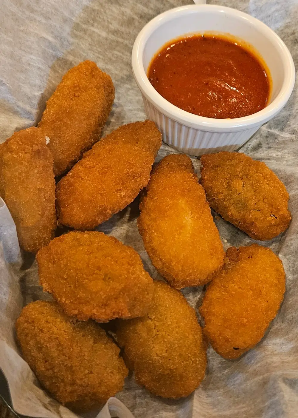 Jalapeño poppers with marinara dipping sauce